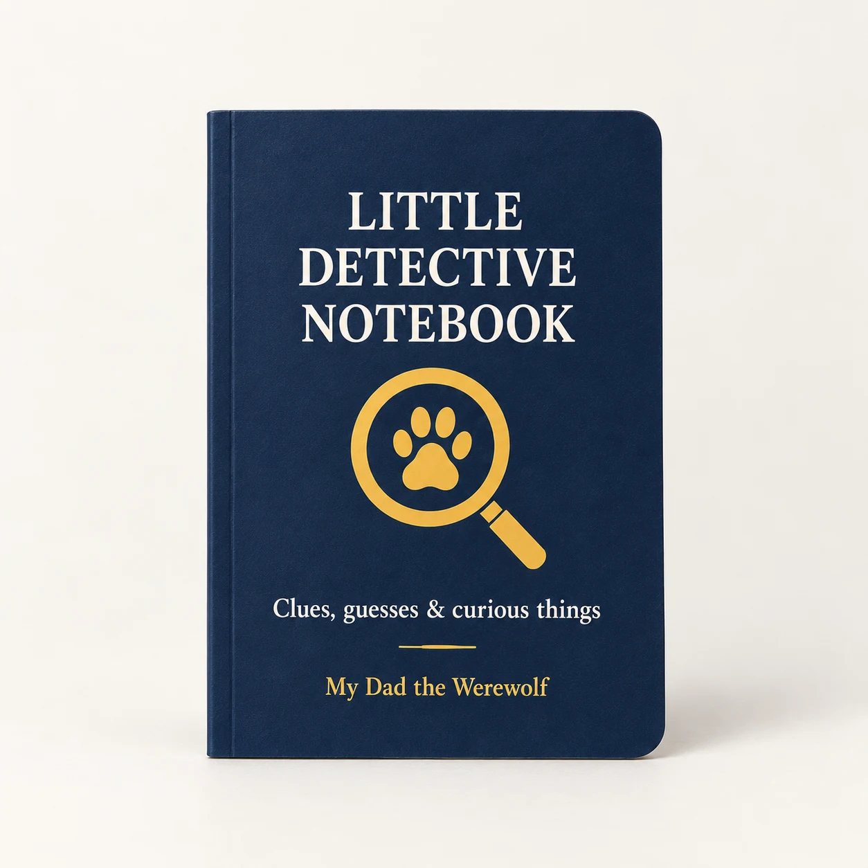 Concept mockup of a navy Little Detective Notebook with a gold magnifying glass and paw.