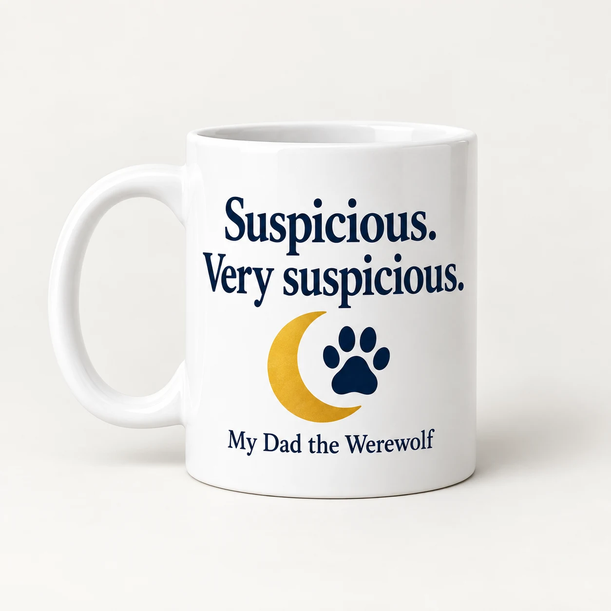 Concept mockup of a white mug reading Suspicious... VERY suspicious. with a moon and paw graphic.